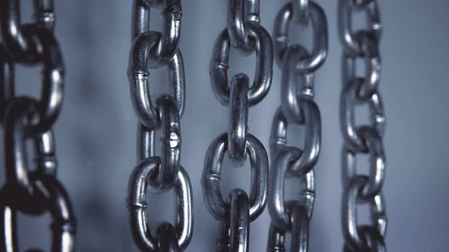 Many chains hang and swing