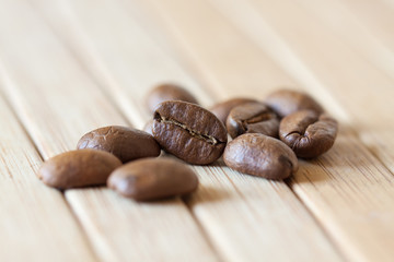 Coffee beans on wooden table cloth, decorative wallpaper