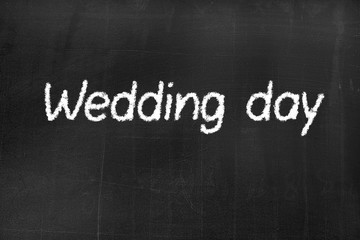 Obraz premium Blackboard with the text 'Wedding day'