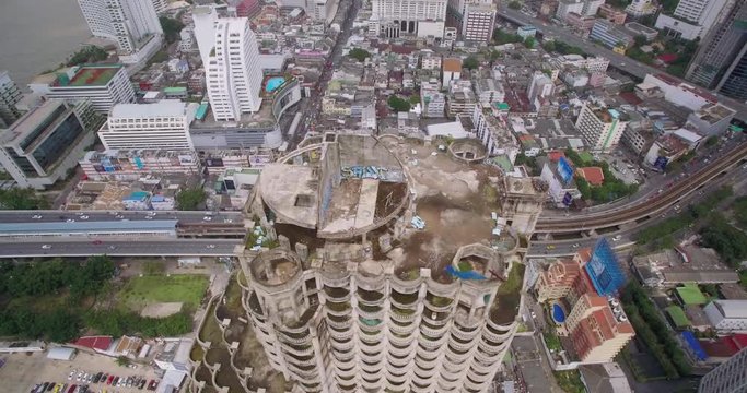 Abandoned Condominium Tower in Bangkok, Overhead Aerial Slider Shot
