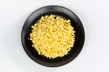 corns on block plate isolated on white background

