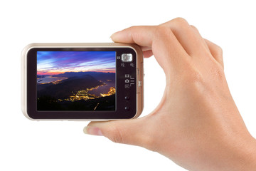 Hand with camera and Kotor Bay in Montenegro image (my photo)