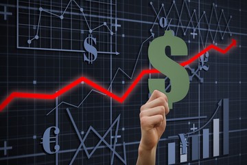 Composite image of hand holding dollar sign