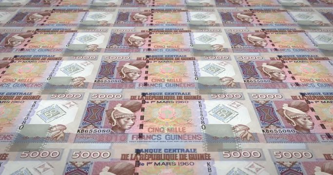 Banknotes of five thousand guinean francs rolling, cash money, loop
