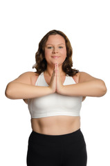 Smiling fat woman is engaged in fitness