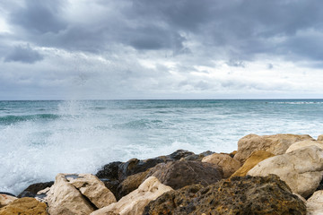 Fototapeta na wymiar Water fighting against rocks of Altea, Alicante, Spain