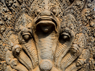 Seven heads Naga stone carving at cambodia.
