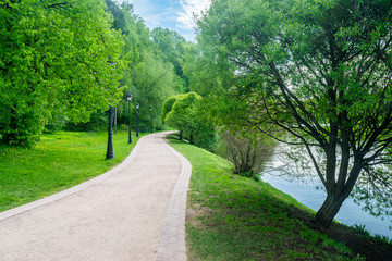 The pathway along the Upper pond in Tsaritsyno park and reserve in Moscow, Russia