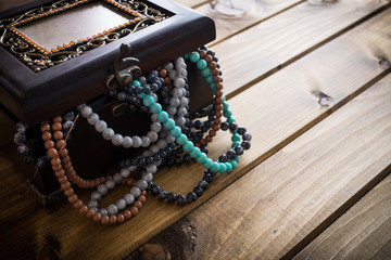 jewelry box full of beads, treasure chest.