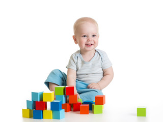 toddler kid boy playing wooden toys