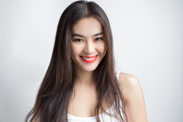 Young beautiful Asian woman with smiley face.