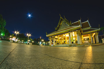 Mahajetsadabodin Royal Pavilion near Ratchanatda Temple located in Bangkok,Thailand taken by fish eye lens on twilight
