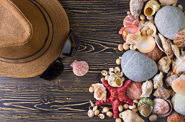 Beach accessories on wooden board