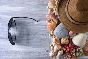 Beach accessories on wooden board