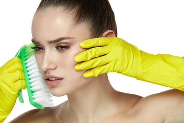 Facial Skin Care. Sexy Woman In Gloves Scrubbing Face With Brush