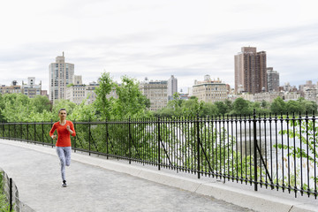 Young beautiful woman running.