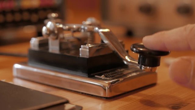 Morse code transmitter being used, communication old style, corner angle