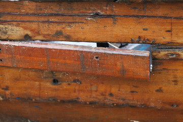 Old rotten wooden boat.