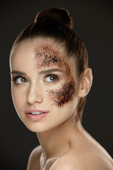 Fototapeta premium Woman Face Skin Care. Girl With Coffee Skin Scrub On Face