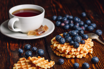 Belgian Waffles with Blueberry and Cup of Tea.