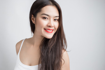 Young beautiful Asian woman with smiley face.