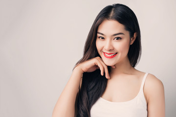 Young beautiful Asian woman with smiley face.