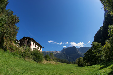 Fototapeta premium Landscape protection area Achstürze. Lake Piburger See, Tirol oldest nature preserves. Oetz alps, unique cultural mountains landscape, alps in the background. Ötztal valley.