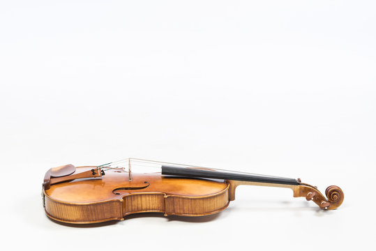 The old fiddle, isolated on white background. Viola, Instrument for classical music.