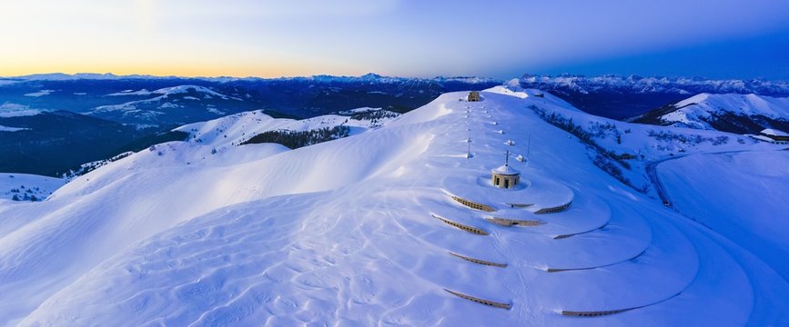 Aerial view of Military war memorial on the summit of Monte Grappa at twilight, Italy