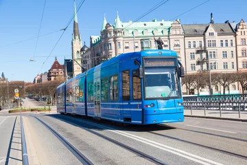 Zelfklevend Fotobehang Modern tram in Stockholm © Sergii Figurnyi
