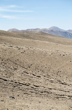 View to cracked arid land in desert