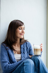 Woman having coffee break