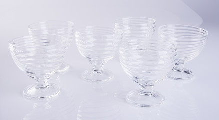 glass cup or empty glass mug on background.