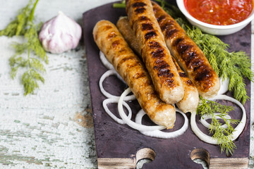 Grilled sausage with sauce and vegetables