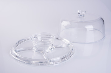 glass plate or glass food cover on background.