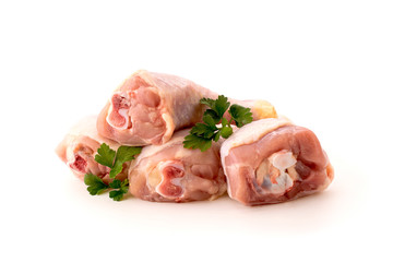 Chicken thighs on a white