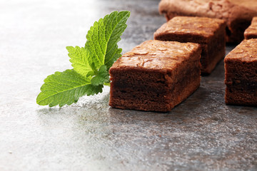 homemade chocolate brownies on grey background