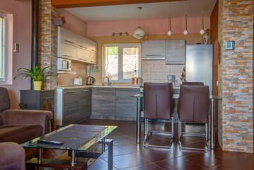 Interior of a guest house room with a kitchen