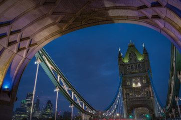 Traffic on Tower bridge at night, London, England