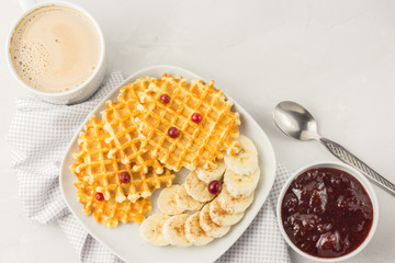  Waffles with banana and berries. 