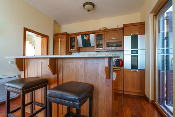Interior of a guest house room with kitchen