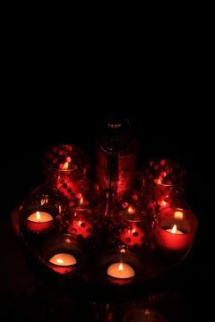 Red votives and candles