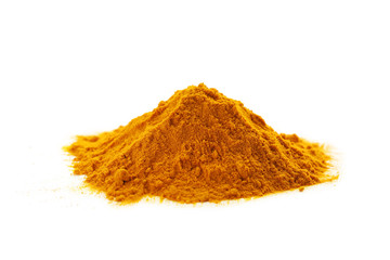 Pile of turmeric powder isolated on a white