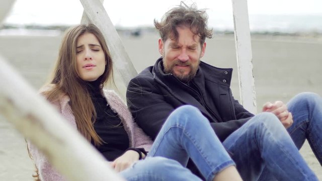 Man trying to make peace with angry girlfriend