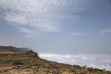 monsoon (khareef) clouds below the cliffs in Dhofar mountains, Salalah, Oman