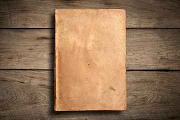 Old paper on wood background.