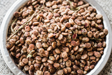 Sumac Seeds on silver plate