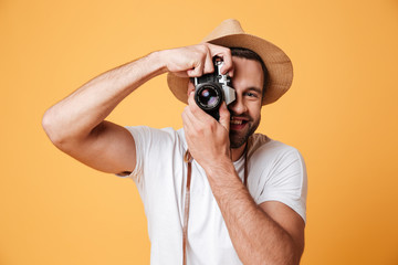 Young man trying to take photo