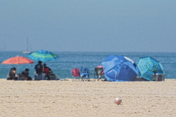 Umbrellas on a sandy beach near the ocean