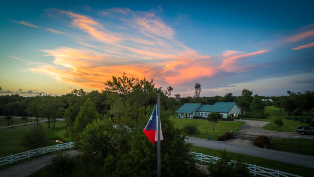 Texas Flag At Sunset